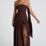 Vestido longo feminino em algodão, decote redondo, design elegante com fenda lateral para mais movimento e conforto.