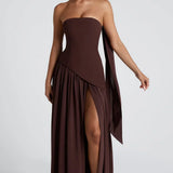 Vestido longo feminino em algodão, decote redondo, design elegante com fenda lateral para mais movimento e conforto.