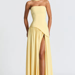 Vestido longo feminino em algodão com decote redondo e fenda elegante lateral para um estilo descontraído.