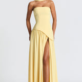 Vestido longo feminino em algodão com decote redondo e fenda elegante lateral para um estilo descontraído.