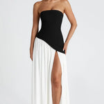 Vestido longo em jersey com decote redondo e fenda lateral para um look fluido e elegante, ideal para ocasiões especiais…